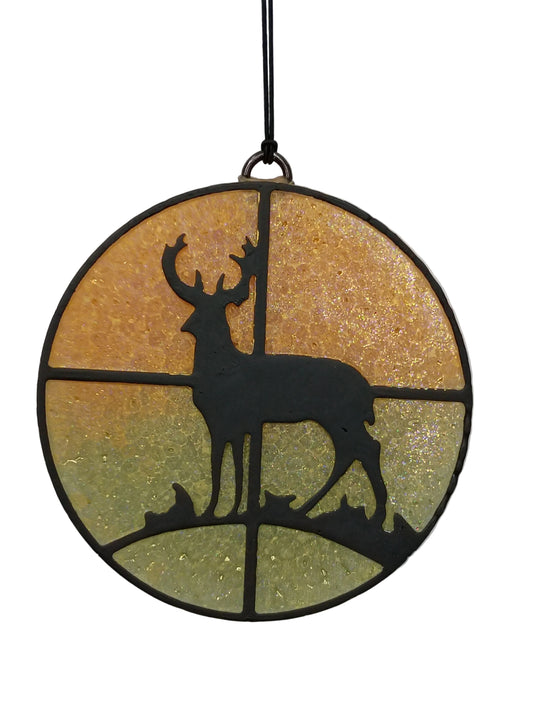 Buck in sights silhouette on a green and orange ombre base  for a sunset look. 