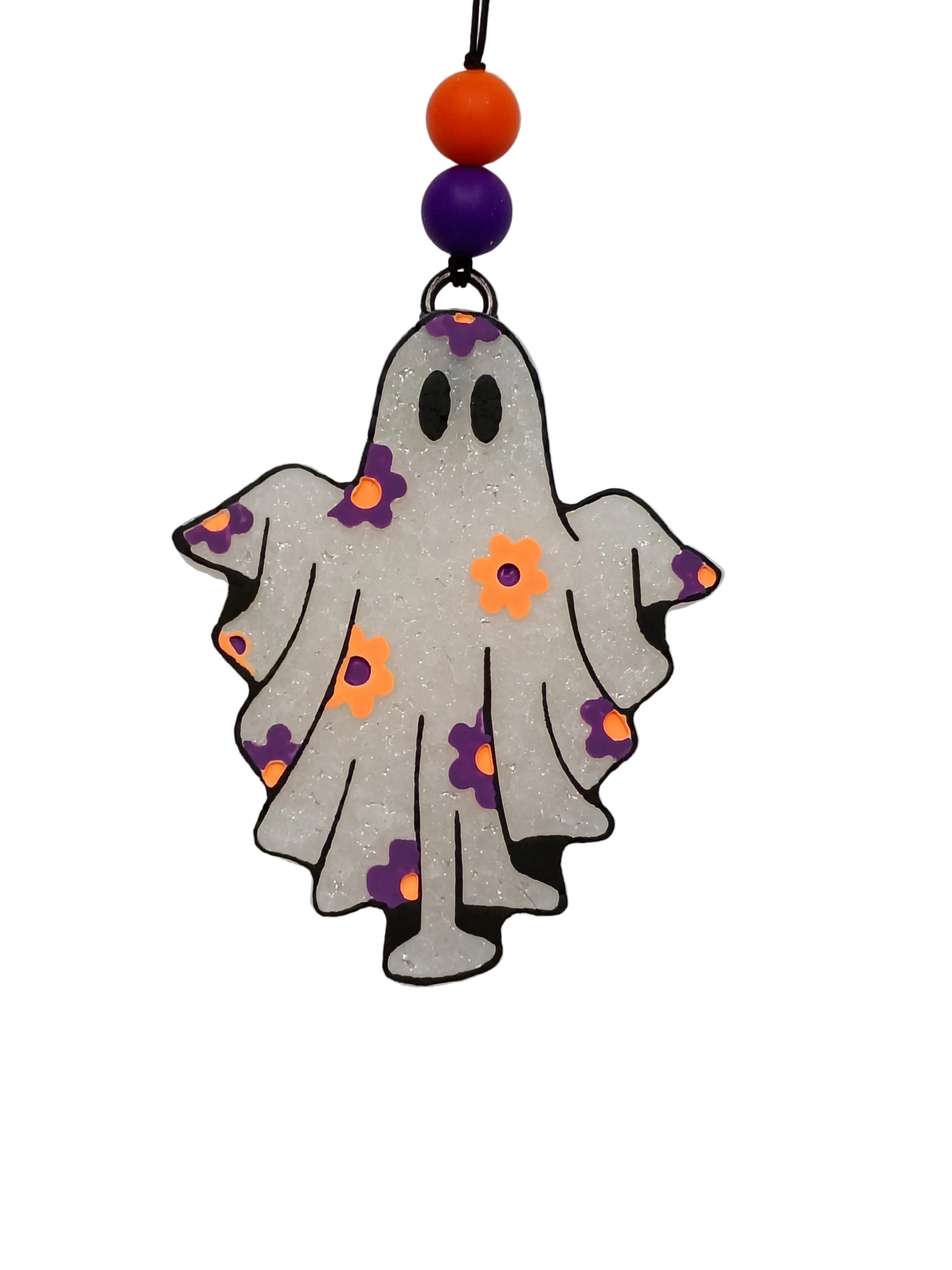  This adorable ghost-shaped freshie features a crisp white base with black outline details, accented with vibrant orange and purple flowers and matching beads for that perfect Halloween vibe.